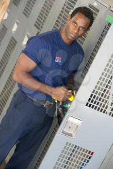 Royalty Free Photo of a Firefighter at the Locker