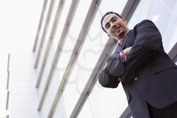 Royalty Free Photo of a Man Outside a Building