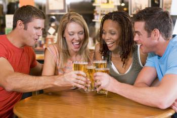 Royalty Free Photo of Two Couples Drinking