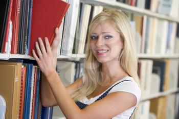 Royalty Free Photo of a Girl in a Library