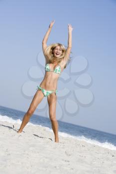 Royalty Free Photo of a Happy Woman on the Beach