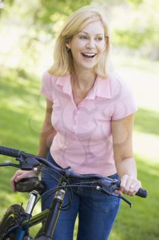 Royalty Free Photo of a Woman With a Bike