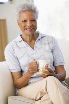 Royalty Free Photo of a Woman Having Coffee