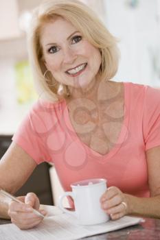 Royalty Free Photo of a Woman Drinking Coffee
