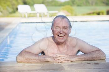 Royalty Free Photo of a Man at a Swimming Pool