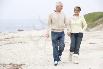 Royalty Free Photo of a Couple Walking on a Beach