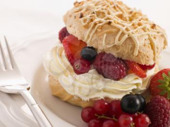 Royalty Free Photo of Choux Bun Filled with Mixed Berries and Chantilly Cream