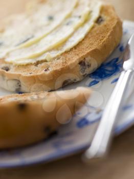 Royalty Free Photo of a Toasted Tea Cake with Butter
