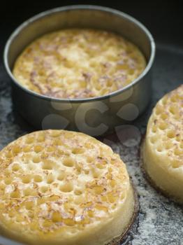 Royalty Free Photo of Crumpets in a Frying Pan