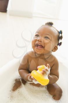 Royalty Free Photo of a Baby in a Tub