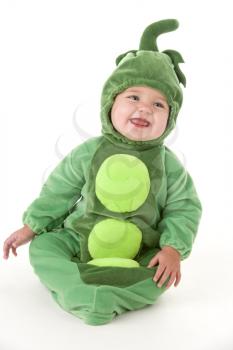 Baby in peas in pod costume smiling