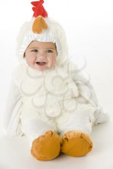 Royalty Free Photo of a Baby in a Chicken Costume