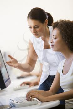 Royalty Free Photo of Two Women at Computers