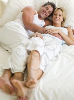 Royalty Free Photo of a Couple in Bed