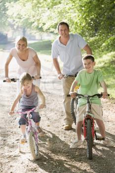 Royalty Free Photo of a Family Cycling