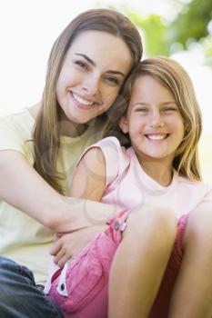 Royalty Free Photo of a Woman and Young Girl Outside