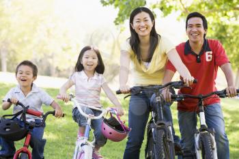Royalty Free Photo of a Family on Bikes