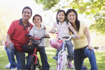 Royalty Free Photo of a Family With Bikes