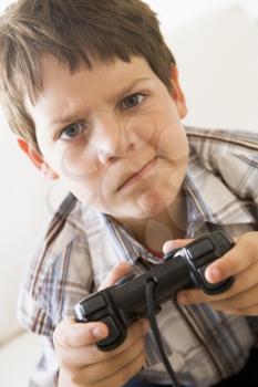 Royalty Free Photo of a Young Boy With a Game Controller