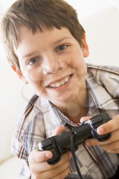 Royalty Free Photo of a Boy With a Game Controller