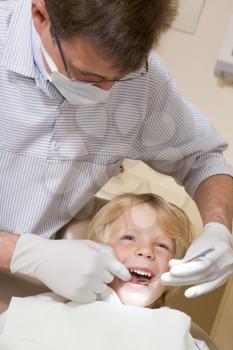 Royalty Free Photo of a Boy at the Dentist