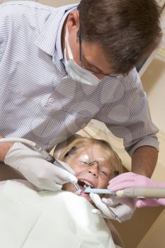 Royalty Free Photo of a Boy at the Dentist