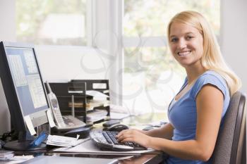 Royalty Free Photo of a Woman With a Computer