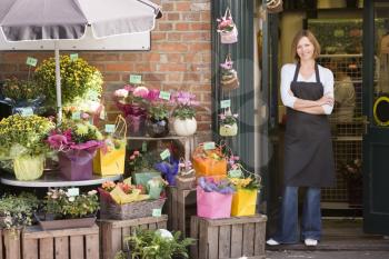 Royalty Free Photo of a Woman at a Flower Shop