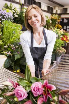Royalty Free Photo of a Woman in a Flower Shop