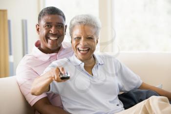 Royalty Free Photo of a Couple Watching Television