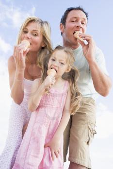 Royalty Free Photo of a Family Eating Ice Cream