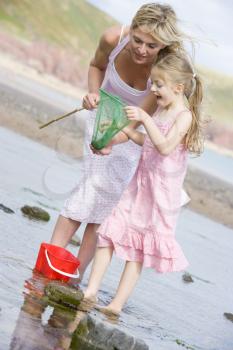 Royalty Free Photo of a Mother and Daughter at the Beach