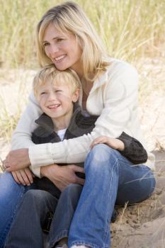 Royalty Free Photo of a Mother and Son Sitting in the Sand