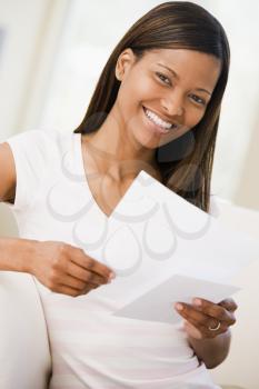 Royalty Free Photo of a Woman Reading Papers