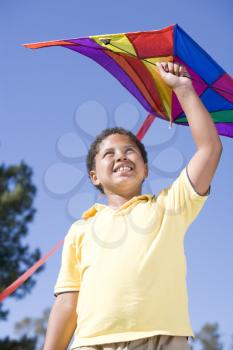 Royalty Free Photo of a Boy With a Kite