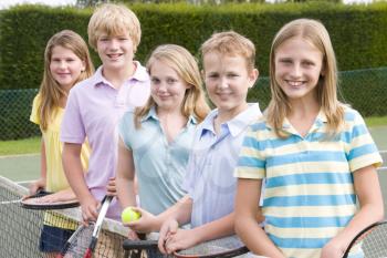 Royalty Free Photo of Five Children on a Tennis Court With Rackets