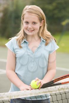 Royalty Free Photo of a Girl on a Tennis Court
