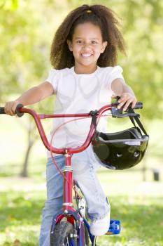 Royalty Free Photo of a Little Girl on a Bike