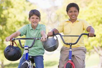 Royalty Free Photo of Two Boys on Bikes