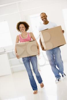 Royalty Free Photo of a Couple Moving In To a New Home