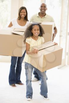 Royalty Free Photo of a Family Moving Into a New Home