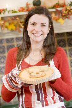 Royalty Free Photo of a Woman Making a Halloween Pie