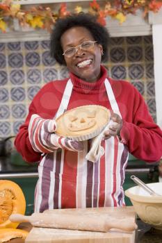Royalty Free Photo of a Woman With a Halloween Pie