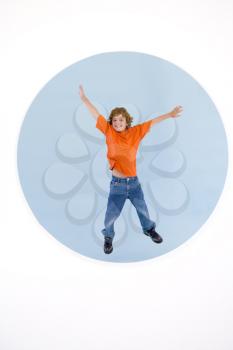Royalty Free Photo of a Boy Jumping