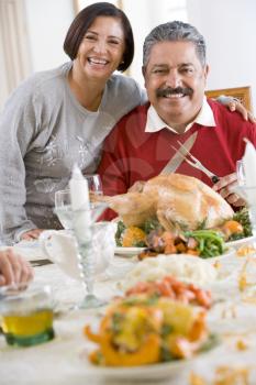 Royalty Free Photo of a Couple With the Christmas Turkey