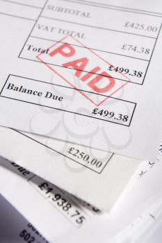 Royalty Free Photo of Paid Invoices