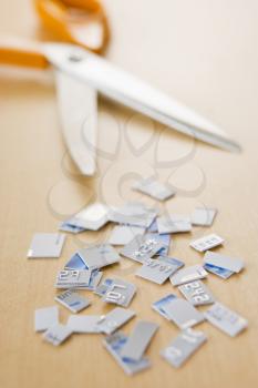 Royalty Free Photo of a Credit Card Cut In To Pieces