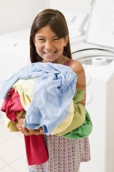 Royalty Free Photo of a Little Girl With Laundry