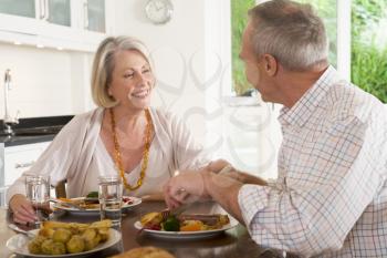 Royalty Free Photo of a Couple Having a Meal