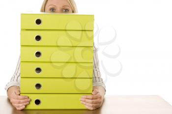 Royalty Free Photo of a Woman With a Stack of Folders